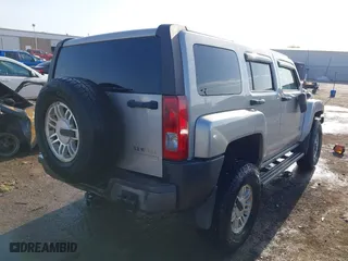 2006 Hummer H3 with VIN 5GTDN136868194546, listed as a IAAI auction lot 41981341 with 128,686 mi miles. Bid and sale history available at carsss.com. Image 4.