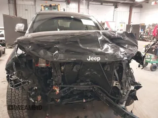 2021 Jeep Grand Cherokee 80th Anniversary with VIN 1C4RJFBG5MC732694, listed as a IAAI auction lot 41410124 with 84,958 mi miles and . Bid and sale history available at DreamBid. Image 13.