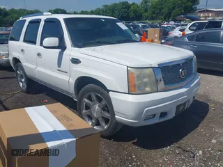 2002 Cadillac Escalade with VIN 1GYEC63T82R123995, listed as a IAAI auction lot 42557625 with 383,749 mi miles and . Bid and sale history available at DreamBid. Image 1.