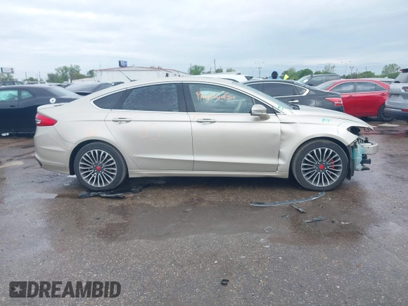 2018 Ford Fusion Titanium with VIN 3FA6P0D9XJR241859, listed as a IAAI auction lot 41893946 with 125,189 mi miles and . Bid and sale history available at DreamBid. Image 14.
