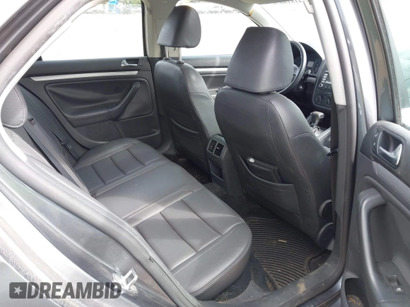 2009 Volkswagen Jetta Sedan SE with VIN 3VWRM71K59M069259, listed as a IAAI auction lot 41818850 with 164,157 mi miles. Bid and sale history available at carsss.com. Image 8.