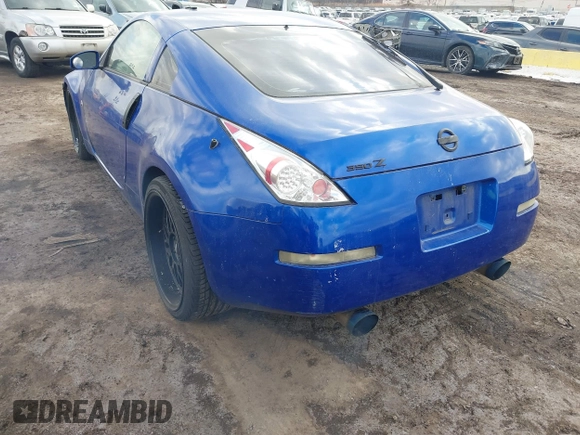 2004 Nissan 350Z Touring with VIN JN1AZ34E04T052916, listed as a IAAI auction lot 41450917 with 157,699 mi miles. Bid and sale history available at carsss.com. Image 13.