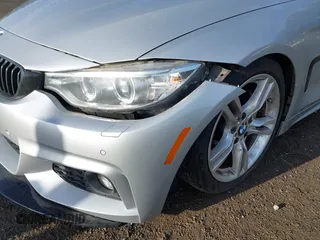 2016 BMW 4 Series 428i xDrive with VIN WBA4C9C5XGG135893, listed as a IAAI auction lot 41976541 with 86,987 mi miles and . Bid and sale history available at carsss.com. Image 22.
