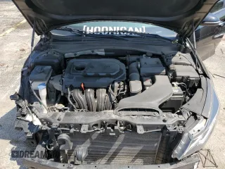 2020 Kia Optima LX z VIN 5XXGT4L35LG399462, wystawiony jako Copart lot #56368455 z przebiegiem 108 889 mil mil oraz Szkoda całkowita • Salvage title. Historia ofert i sprzedaży dostępna na DreamBid. Obrazek 11.