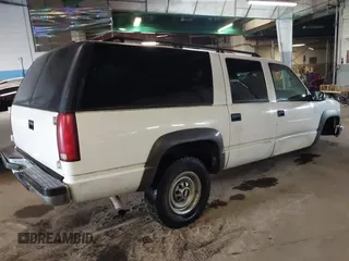 1997 Chevrolet Suburban with VIN 3GNGK26R2VG154004, listed as a IAAI auction lot 42255578 with 213,345 mi miles and . Bid and sale history available at DreamBid. Image 4.