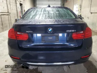 2013 BMW 3 Series 328i xDrive with VIN WBA3B3C57DF537268, listed as a Copart auction lot 57885985 with 122,050 mi miles and Salvage title. Bid and sale history available at DreamBid. Image 6.