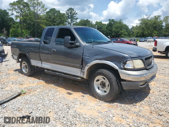 2002 Ford F-150 XL z VIN 1FTRX18L52NB59531, wystawiony jako Copart lot #58550365 z przebiegiem 267 424 mil mil oraz Szkoda całkowita • Salvage title. Historia ofert i sprzedaży dostępna na DreamBid. Obrazek 4.