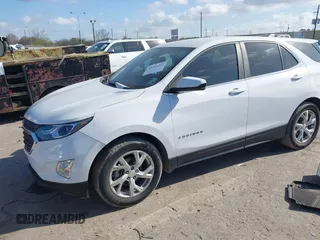 2021 Chevrolet Equinox LT with VIN 3GNAXKEV1ML351581, listed as a IAAI auction lot 41764202 with 71,547 mi miles and . Bid and sale history available at DreamBid. Image 2.