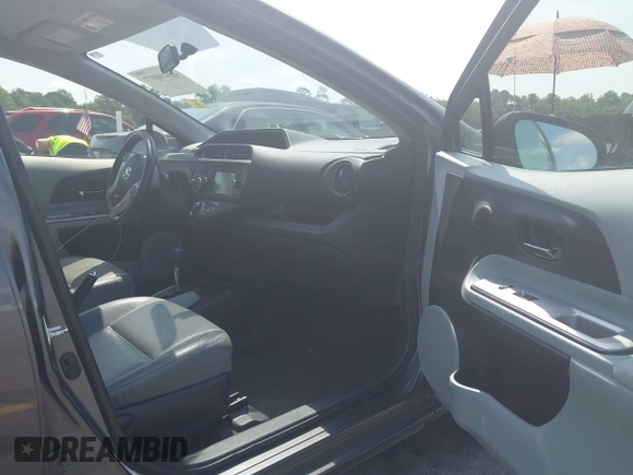 2012 Toyota Prius One z VIN JTDKDTB3XC1020910, wystawiony jako IAAI lot #42416977 z przebiegiem 238 822 mil mil oraz . Historia ofert i sprzedaży dostępna na DreamBid. Obrazek 5.