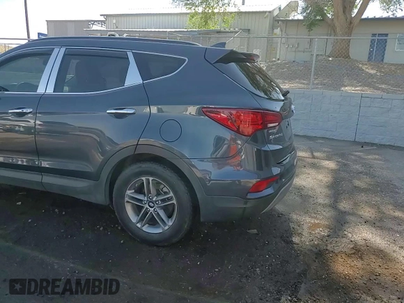 2018 Hyundai Santa Fe 2.4L с VIN 5NMZUDLB6JH097285, выставлен на аукционе Copart как лот 62333795 с пробегом 90 476 миль миль и Списание • Salvage title. История ставок и продаж доступна на DreamBid. Изображение 14.