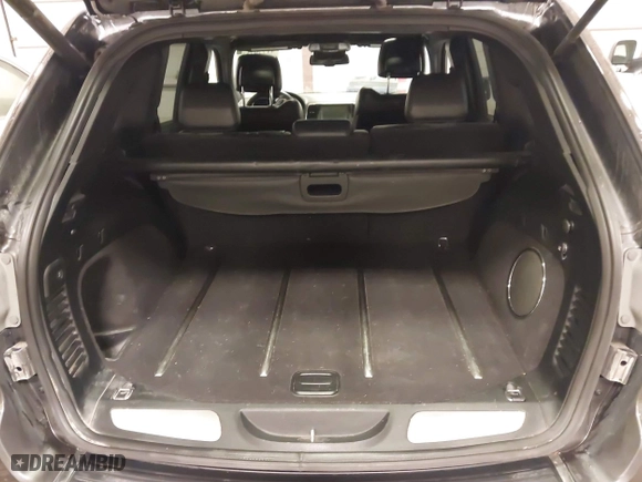 2016 Jeep Grand Cherokee Limited 75th Anniversary with VIN 1C4RJFBGXGC425705, listed as a IAAI auction lot 41779755 with 142,711 mi miles. Bid and sale history available at carsss.com. Image 18.