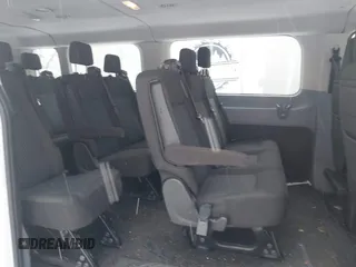 2019 Ford Transit Passenger XL z VIN 1FBZX2ZM4KKB53934, wystawiony jako IAAI lot #41260226 z przebiegiem 153 409 mil mil oraz . Historia ofert i sprzedaży dostępna na DreamBid. Obrazek 8.