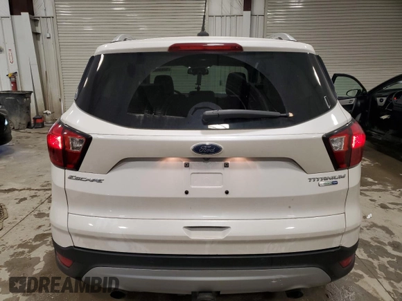 2019 Ford Escape Titanium with VIN 1FMCU9J94KUA02845, listed as a Copart auction lot 52096895 with 69,689 mi miles and Salvage Title. Bid and sale history available at carsss.com. Image 6.