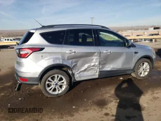 2018 Ford Escape SE with VIN 1FMCU0G96JUC38690, listed as a Copart auction lot 86504514 with 90,811 mi miles and Salvage Title. Bid and sale history available at carsss.com. Image 3.