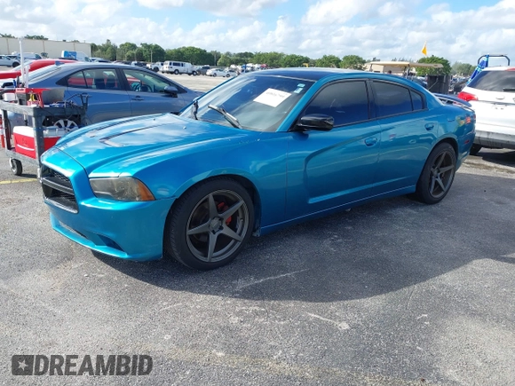 2012 Dodge Charger SXT with VIN 2C3CDXHG0CH185859, listed as a IAAI auction lot 40816799 with 132,572 mi miles. Bid and sale history available at carsss.com. Image 2.