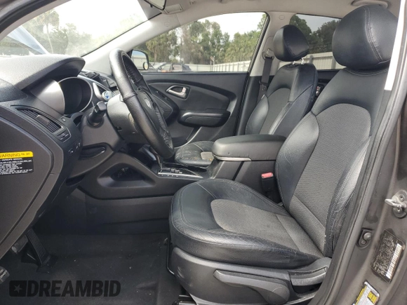 2010 Hyundai Tucson GLS with VIN KM8JU3AC2AU079129, listed as a Copart auction lot 54312875 with 116,659 mi miles and Salvage Title. Bid and sale history available at DreamBid. Image 7.