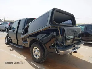 1999 Ford F-150 XL with VIN 1FTRX08L3XKB12260, listed as a IAAI auction lot 42244781 with Not provided miles and . Bid and sale history available at DreamBid. Image 3.