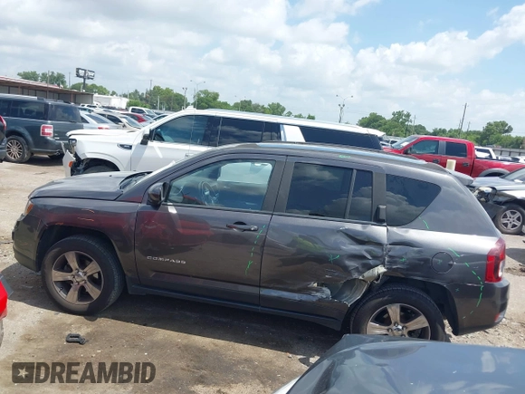 2016 Jeep Compass High Altitude with VIN 1C4NJDEB2GD730774, listed as a IAAI auction lot 42525209 with 143,193 mi miles and . Bid and sale history available at DreamBid. Image 14.
