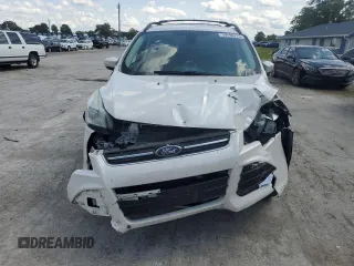 2013 Ford Escape SEL with VIN 1FMCU9H94DUA83824, listed as a Copart auction lot 59198775 with 77,120 mi miles and Salvage title. Bid and sale history available at DreamBid. Image 5.