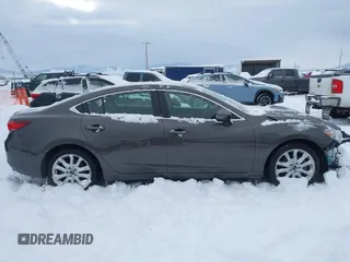 2016 Mazda Mazda6 i Touring with VIN JM1GJ1V58G1458699, listed as a IAAI auction lot 41598598 with 73,576 mi miles. Bid and sale history available at carsss.com. Image 14.