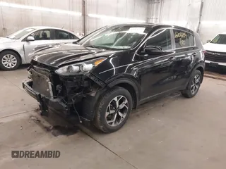 2020 Kia Sportage LX with VIN KNDPMCACXL7804797, listed as a IAAI auction lot 42011299 with 49,793 mi miles and . Bid and sale history available at carsss.com. Image 2.