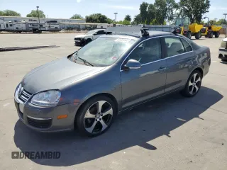 2009 Volkswagen Jetta TDI z VIN 3VWRL71K59M171244, wystawiony jako Copart lot #58281065 z przebiegiem 211 464 mil mil oraz Czysty tytuł • Clean title. Historia ofert i sprzedaży dostępna na DreamBid. Obrazek 1.