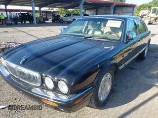 2001 Jaguar XJ Vanden Plas with VIN SAJDA24C81LF23026, listed as a IAAI auction lot 42671098 with 83,759 mi miles and . Bid and sale history available at DreamBid. Image 2.