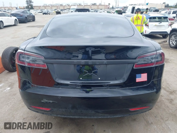 2017 Tesla Model S 60 with VIN 5YJSA1E12HF195965, listed as a IAAI auction lot 41946148 with 63,992 mi miles and . Bid and sale history available at DreamBid. Image 16.