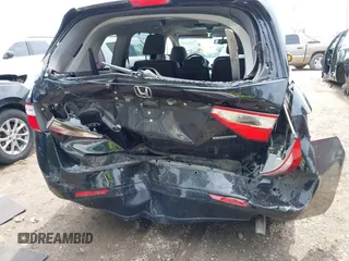 2012 Honda Odyssey Touring with VIN 5FNRL5H91CB121950, listed as a IAAI auction lot 42456620 with 200,831 mi miles and . Bid and sale history available at DreamBid. Image 16.