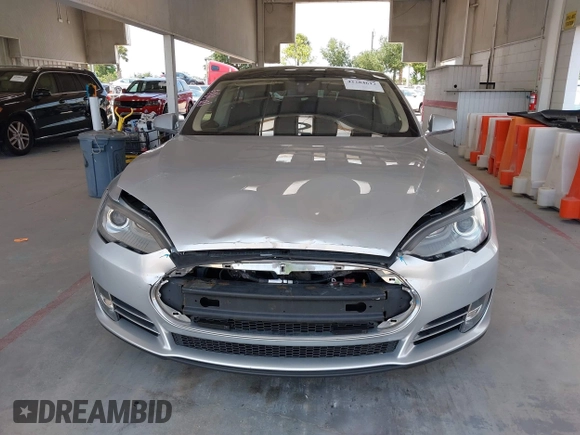 2013 Tesla Model S Performance with VIN 5YJSA1DP6DFP07999, listed as a IAAI auction lot 42284612 with 123,261 mi miles and . Bid and sale history available at DreamBid. Image 13.