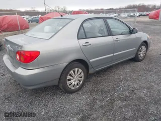 2004 Toyota Corolla CE with VIN 2T1BR32E24C309957, listed as a IAAI auction lot 41894304 with 299,999 mi miles. Bid and sale history available at carsss.com. Image 4.