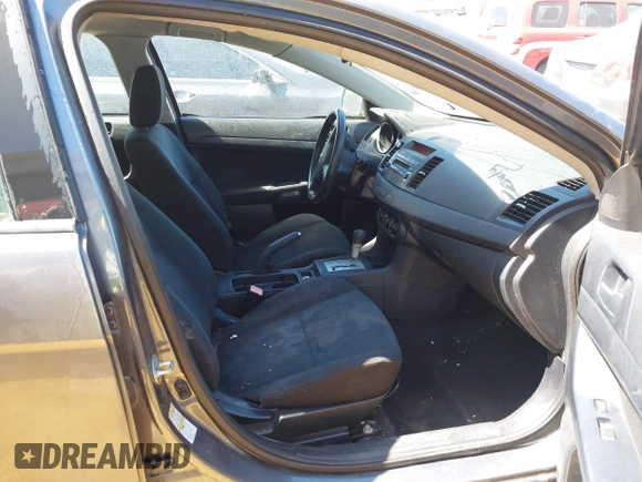 2010 Mitsubishi Lancer DE with VIN JA32U1FU1AU033241, listed as a IAAI auction lot 41805976 with 214,606 mi miles. Bid and sale history available at carsss.com. Image 5.