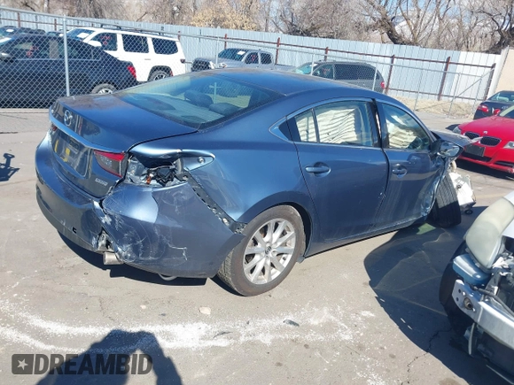 2016 Mazda 6 i Sport with VIN JM1GJ1U57G1451597, listed as a IAAI auction lot 41658184 with 142,504 mi miles and . Bid and sale history available at DreamBid. Image 4.