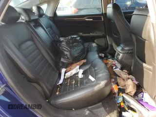 2013 Ford Fusion SE Hybrid z VIN 3FA6P0LU8DR295297, wystawiony jako Copart lot #61830065 z przebiegiem 190 096 mil mil oraz Czysty tytuł • Clean title. Historia ofert i sprzedaży dostępna na DreamBid. Obrazek 10.