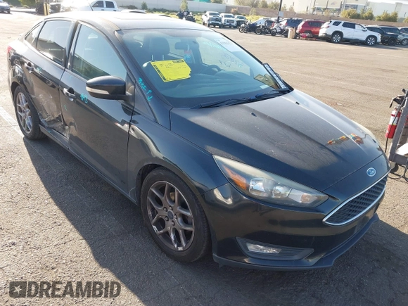 2015 Ford Focus SE with VIN 1FADP3F22FL306055, listed as a IAAI auction lot 41966475 with 139,228 mi miles. Bid and sale history available at carsss.com. Image 1.