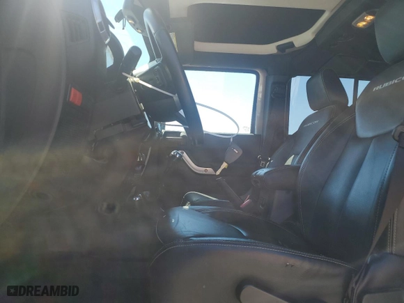 2015 Jeep Wrangler Unlimited Rubicon Hard Rock with VIN 1C4HJWFG2FL686556, listed as a Copart auction lot 54049955 with 126,675 mi miles and Salvage Title. Bid and sale history available at carsss.com. Image 7.
