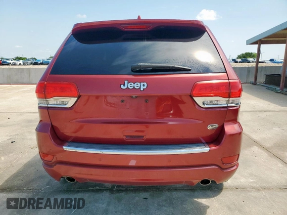 2015 Jeep Grand Cherokee Overland with VIN 1C4RJECG3FC686536, listed as a Copart auction lot 61058215 with 132,282 mi miles and Salvage title. Bid and sale history available at DreamBid. Image 6.