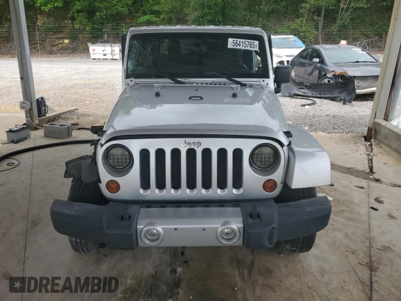 2011 Jeep Wrangler Sahara with VIN 1J4AA5D13BL546742, listed as a Copart auction lot 56415765 with 60,454 mi miles and Salvage title. Bid and sale history available at DreamBid. Image 5.