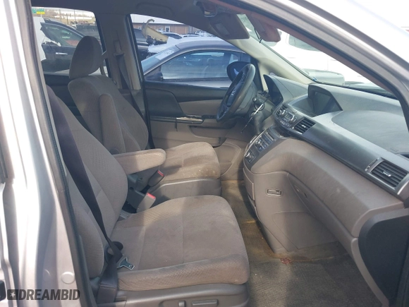2015 Honda Odyssey LX with VIN 5FNRL5H27FB027143, listed as a IAAI auction lot 41239939 with 125,732 mi miles. Bid and sale history available at carsss.com. Image 5.