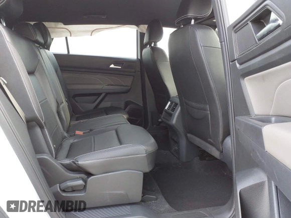 2023 Volkswagen Atlas SE with VIN 1V2WC2CA3PC228213, listed as a IAAI auction lot 42330049 with 21,884 mi miles and . Bid and sale history available at DreamBid. Image 8.