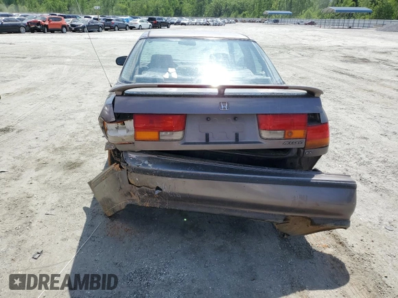 1992 Honda Accord z VIN 1HGCB7277NA019206, wystawiony jako Copart lot #54077035 z przebiegiem 227 766 mil mil oraz Szkoda całkowita • Salvage title. Historia ofert i sprzedaży dostępna na DreamBid. Obrazek 6.