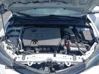 2018 Toyota Corolla L with VIN 5YFBURHE7JP810444, listed as a IAAI auction lot 42558647 with 74,794 mi miles and . Bid and sale history available at DreamBid. Image 10.
