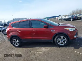 2014 Ford Escape SE with VIN 1FMCU9GX3EUA81161, listed as a IAAI auction lot 41968609 with 112,931 mi miles and . Bid and sale history available at DreamBid. Image 13.