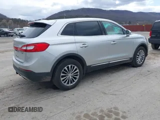 2016 Lincoln MKX Select with VIN 2LMTJ8KR6GBL59043, listed as a IAAI auction lot 41892601 with 113,756 mi miles. Bid and sale history available at carsss.com. Image 4.