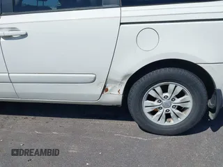 2012 Kia Sedona LX with VIN KNDMG4C71C6447550, listed as a IAAI auction lot 42190357 with 161,960 mi miles and . Bid and sale history available at carsss.com. Image 14.