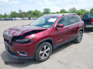 2019 Jeep Cherokee Limited with VIN 1C4PJMDXXKD323087, listed as a IAAI auction lot 42471210 with 57,839 mi miles and . Bid and sale history available at DreamBid. Image 2.