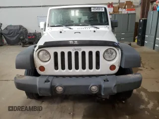 2011 Jeep Wrangler Sport with VIN 1J4AA2D12BL555530, listed as a Copart auction lot 42049915 with 83,349 mi miles and Salvage Title. Bid and sale history available at carsss.com. Image 5.