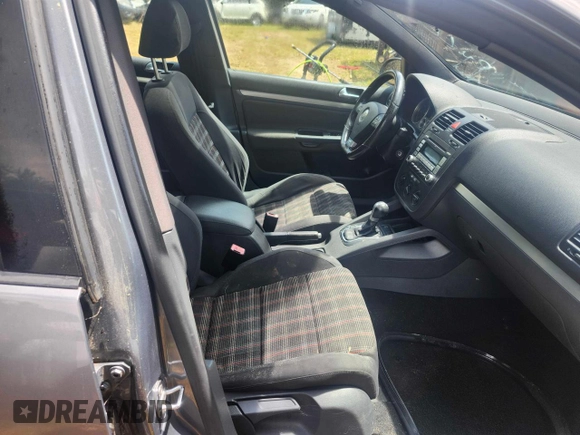 2007 Volkswagen GTI z VIN WVWHV71K27W254409, wystawiony jako Copart lot #61275715 z przebiegiem 144 219 mil mil oraz Czysty tytuł • Clean title. Historia ofert i sprzedaży dostępna na DreamBid. Obrazek 5.