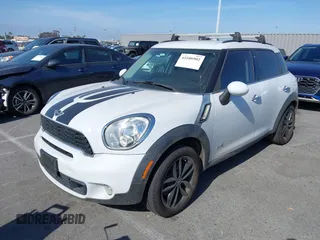 2014 MINI Countryman S с VIN WMWZC5C5XEWM18313, выставлен на аукционе IAAI как лот 42106902 с пробегом 91 662 миль миль и . История ставок и продаж доступна на DreamBid. Изображение 2.