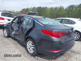 2011 Kia Optima LX with VIN KNAGM4A75B5054483, listed as a IAAI auction lot 41941704 with Not Provided miles and . Bid and sale history available at DreamBid. Image 3.